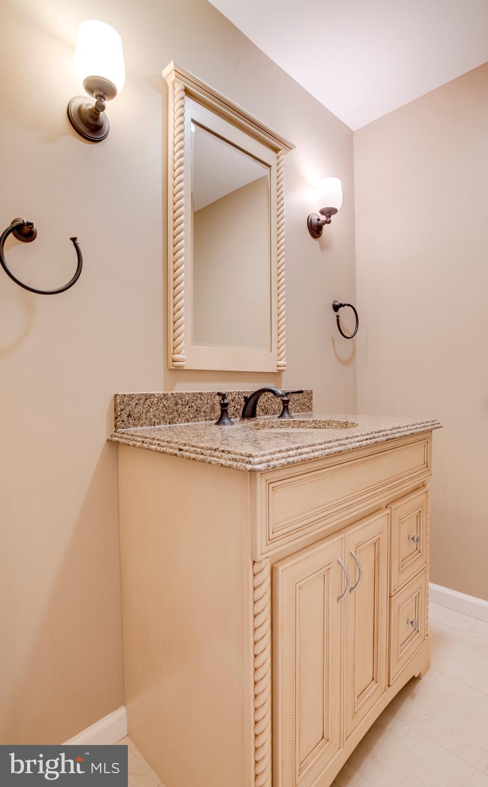 11740 Stuart Mill Road Oakton, VA 22124 - Photo 28 of 67 Main Level Powder Room