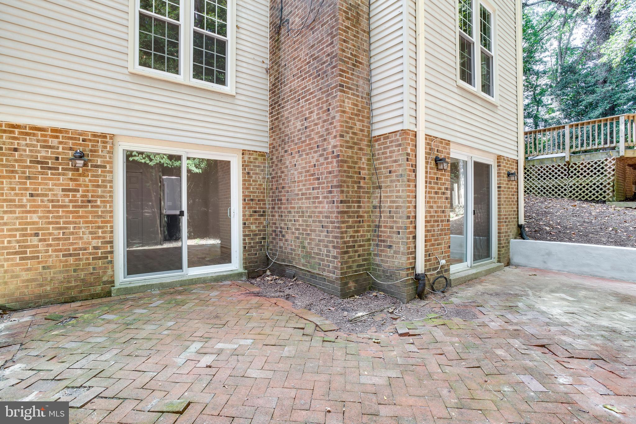 11740 Stuart Mill Road Oakton, VA 22124 - Photo 58 of 67 Rear Walk Out Doors to patio