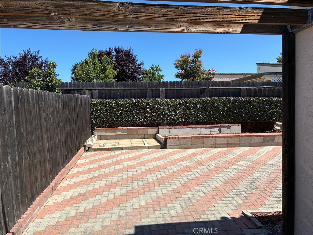 517 Queenanne Road Paso Robles, CA 93446 - Photo 11 of 18 Low maintenance yard with privacy fencing surrounding.