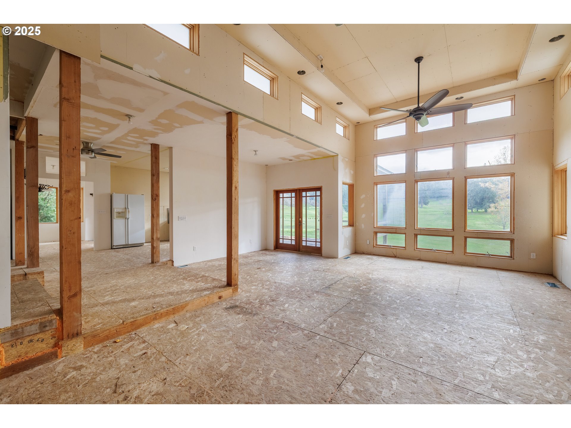 2770 Agate Street Eugene, OR 97403 - Photo 16 of 42 a view of an empty room with window and chandelier