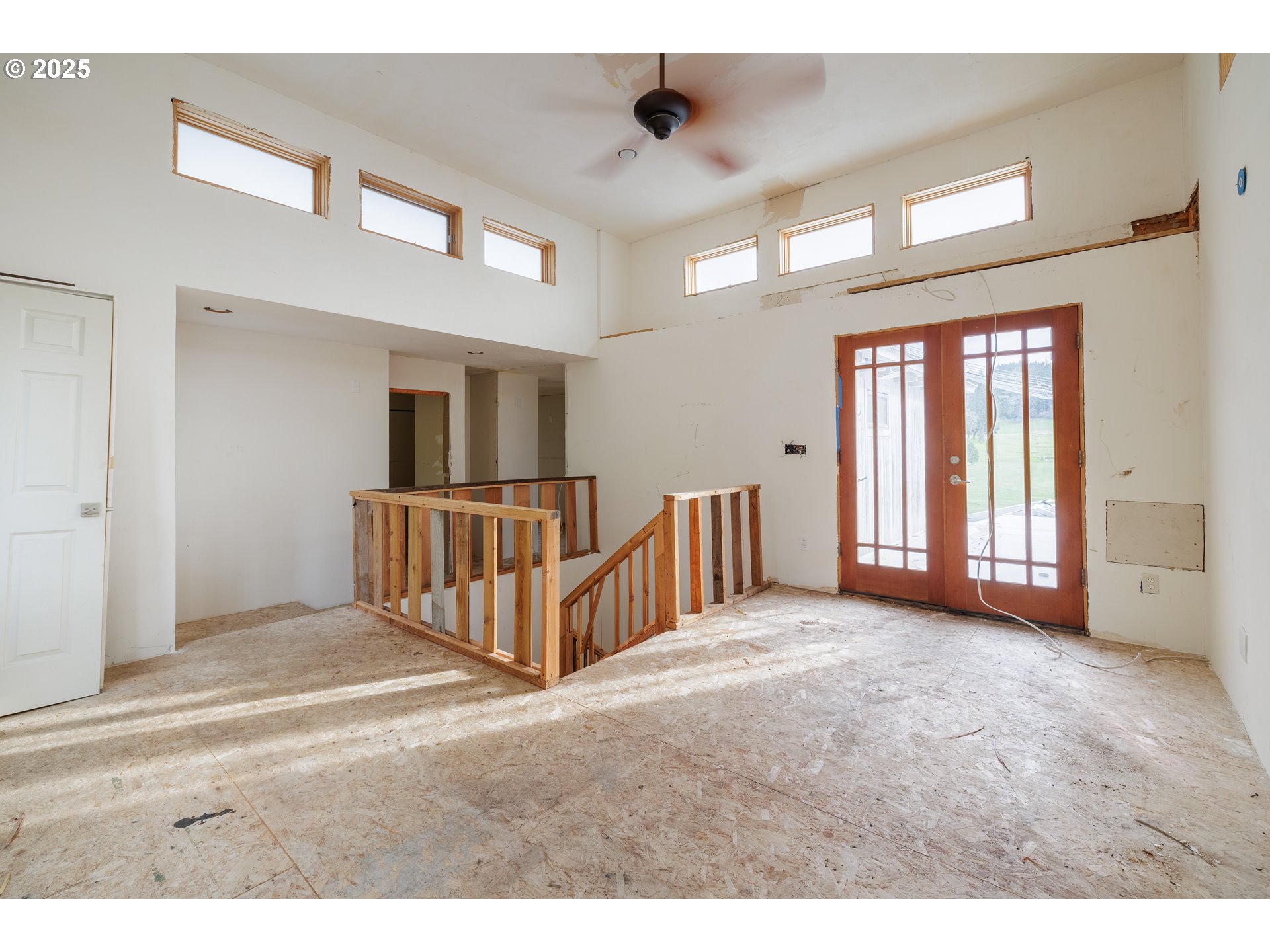 2770 Agate Street Eugene, OR 97403 - Photo 34 of 42 a view of an empty room with wooden floor and a window