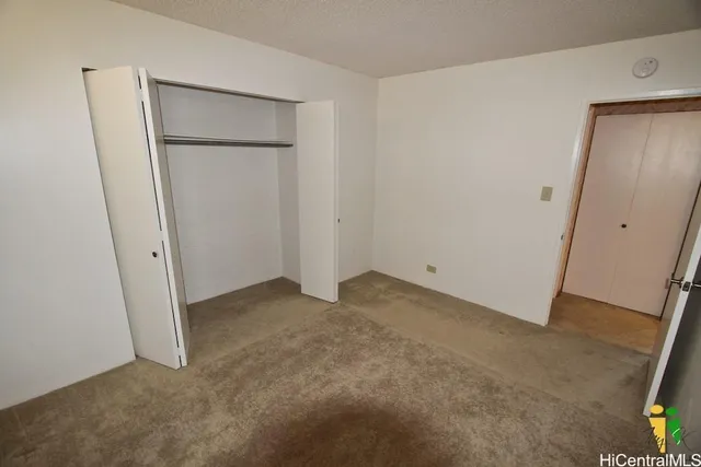 an empty room with closet