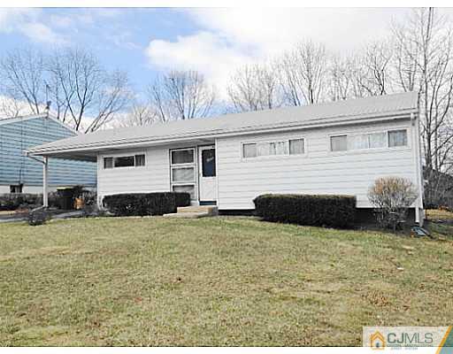 9 Rutgers Road Old Bridge, NJ 08859 - Photo 1 of 7 a view of a house with a yard