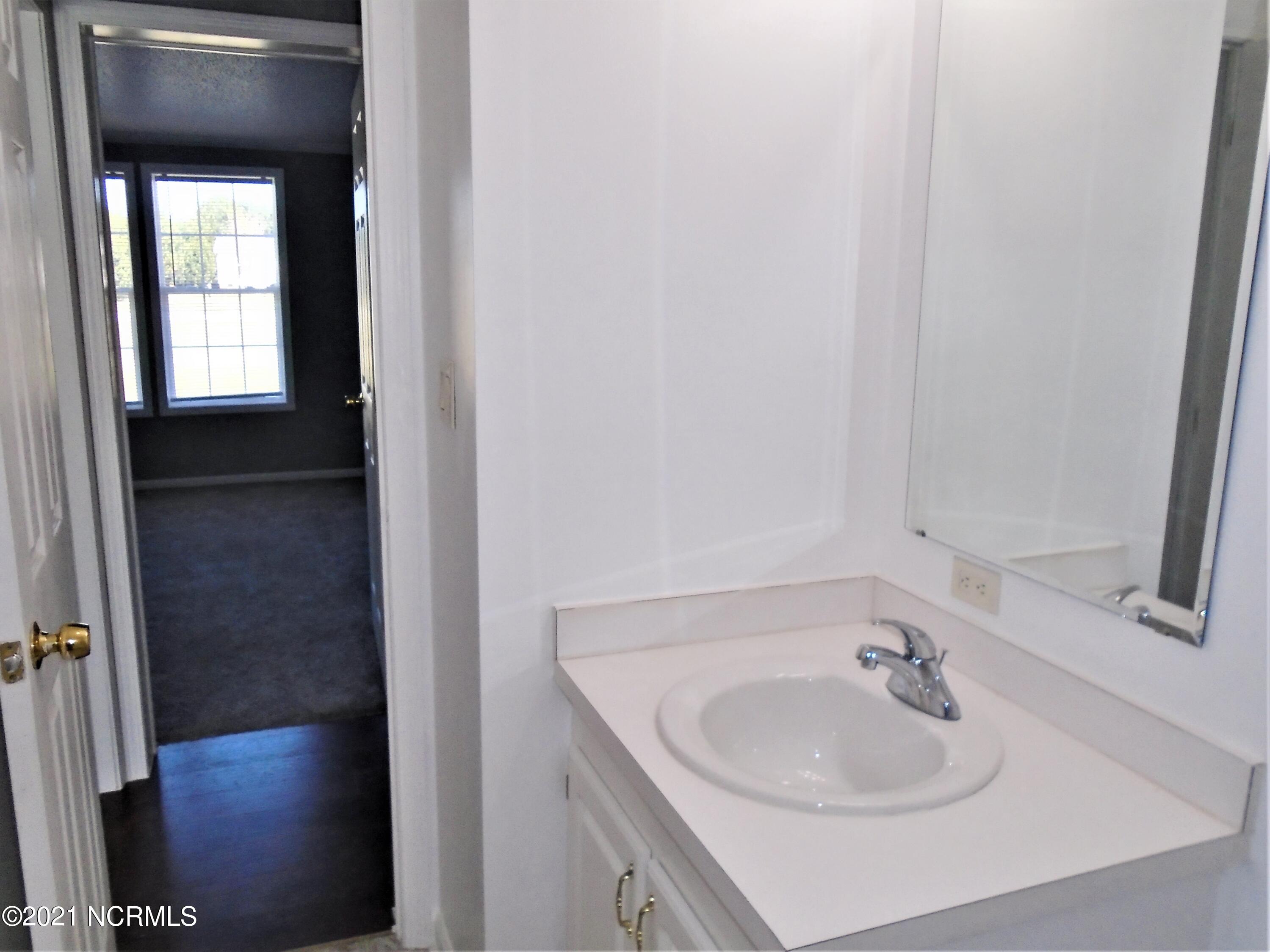 2889 Spring Haven Road Rocky Mount, NC 27804 - Photo 17 of 26 Hallway Full Bath