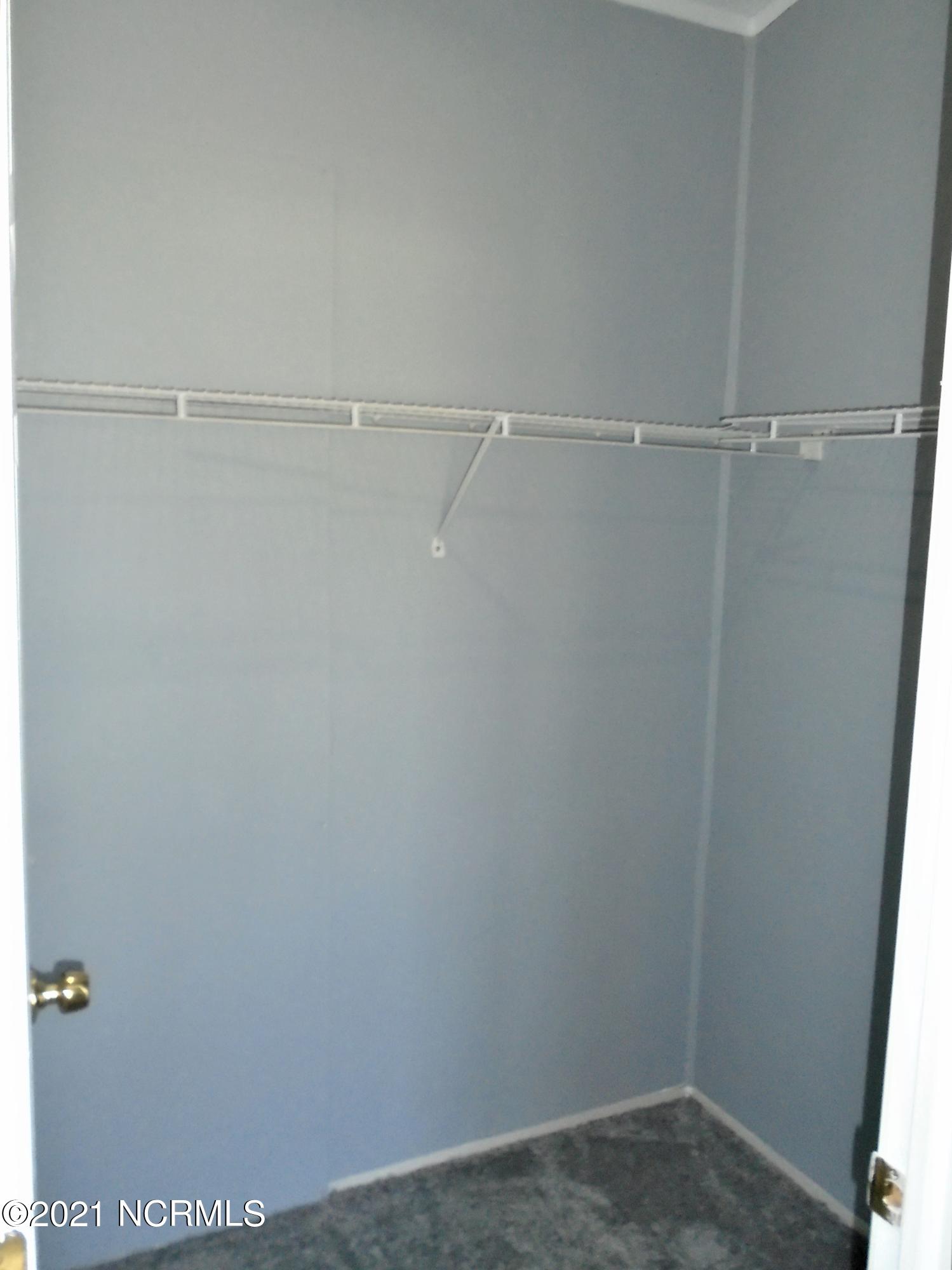 2889 Spring Haven Road Rocky Mount, NC 27804 - Photo 22 of 26 Master bedroom features a walk-in closet