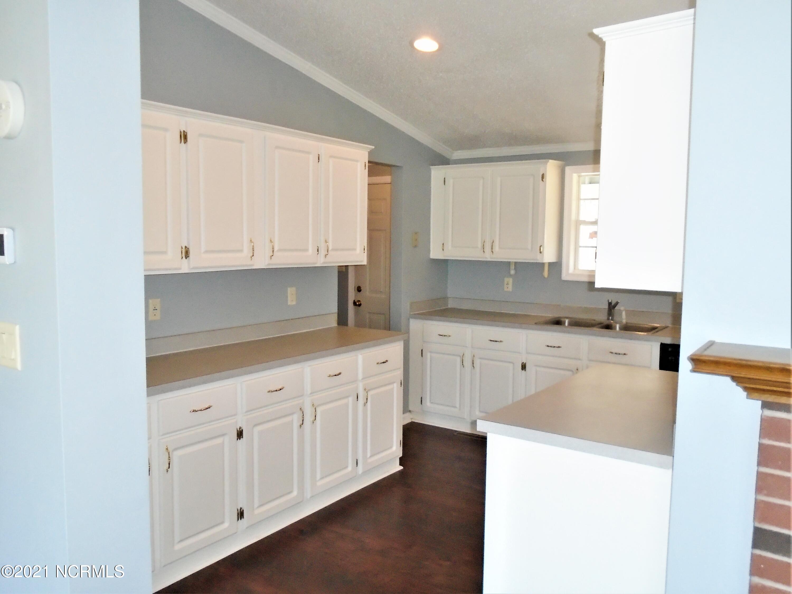 2889 Spring Haven Road Rocky Mount, NC 27804 - Photo 9 of 26 Lots of cabinet space in this kitchen