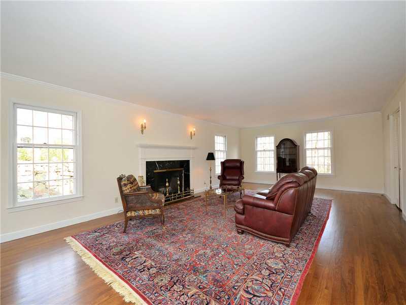 9 Whaling Road Darien, CT 06820 - Photo 3 of 20 a living room with furniture and a fireplace