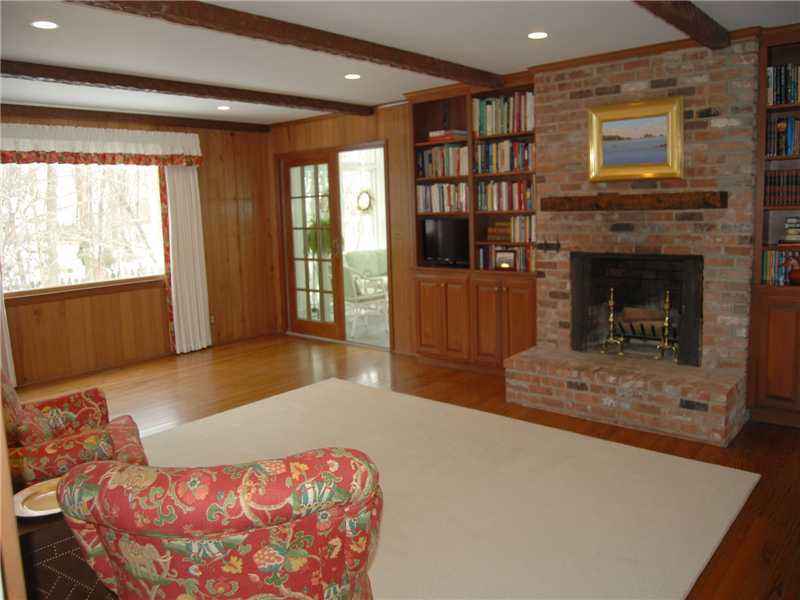 9 Whaling Road Darien, CT 06820 - Photo 8 of 20 a bedroom with furniture and a fireplace