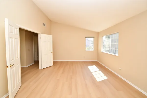 a view of an empty room and window