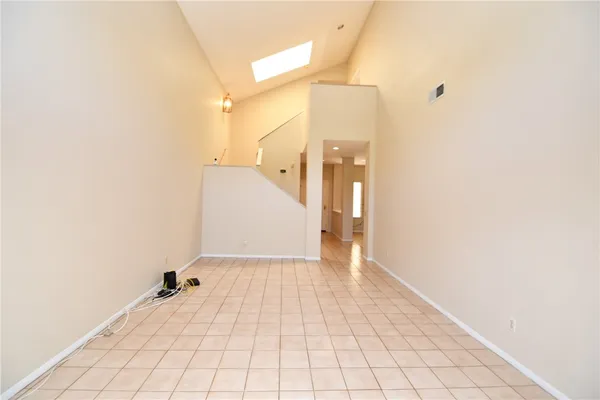 a view of a room with white walls