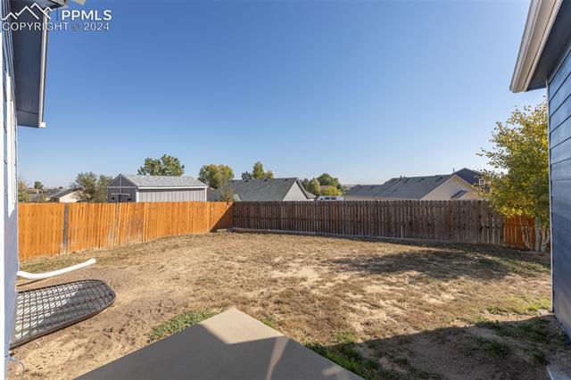 7515 Farmcrest Road Colorado Springs, CO 80925 - Photo 35 of 40 View of yard