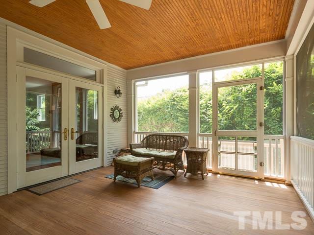115 Hudson Street Raleigh, NC 27608 - Photo 22 of 25 a view of a livingroom with furniture and floor to ceiling window