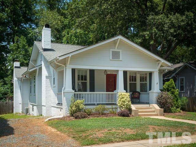 115 Hudson Street Raleigh, NC 27608 - Photo 4 of 25 a front view of a house with garden