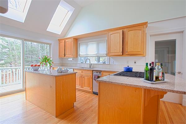 2 Oak Meadow Road Lincoln, MA 01773 - Photo 9 of 21 a kitchen with granite countertop a sink stove and cabinets