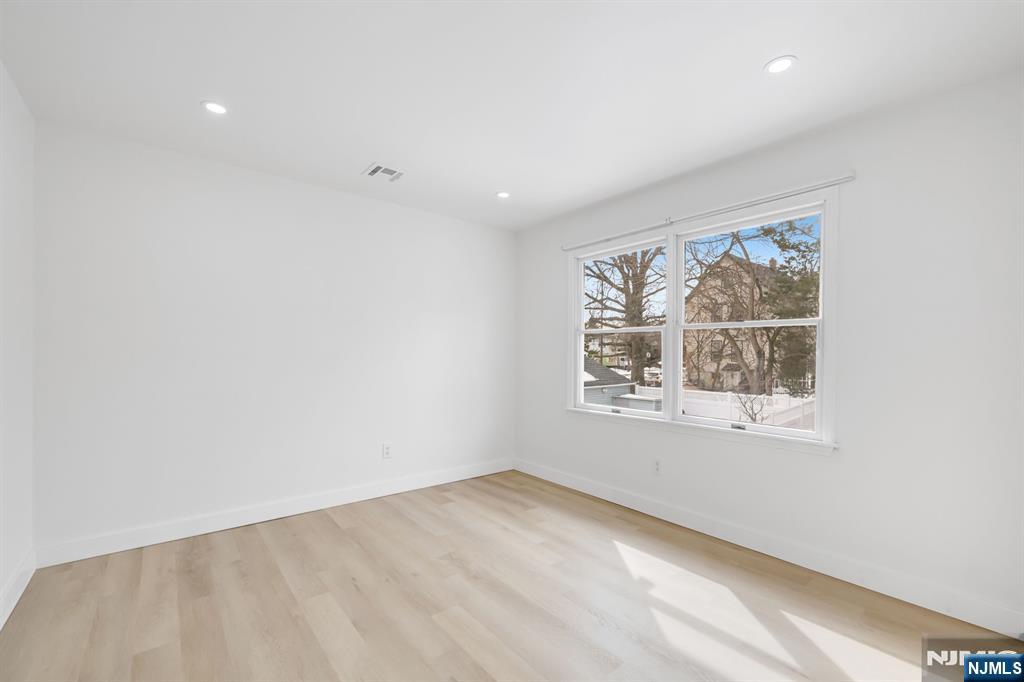 123 Chestnut Street Garfield, NJ 07026 - Photo 14 of 27 an empty room with a window