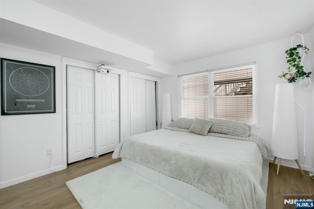 123 Chestnut Street Garfield, NJ 07026 - Photo 21 of 27 a bedroom with a bed and a window