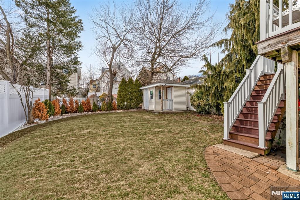 123 Chestnut Street Garfield, NJ 07026 - Photo 26 of 27 a backyard of a house