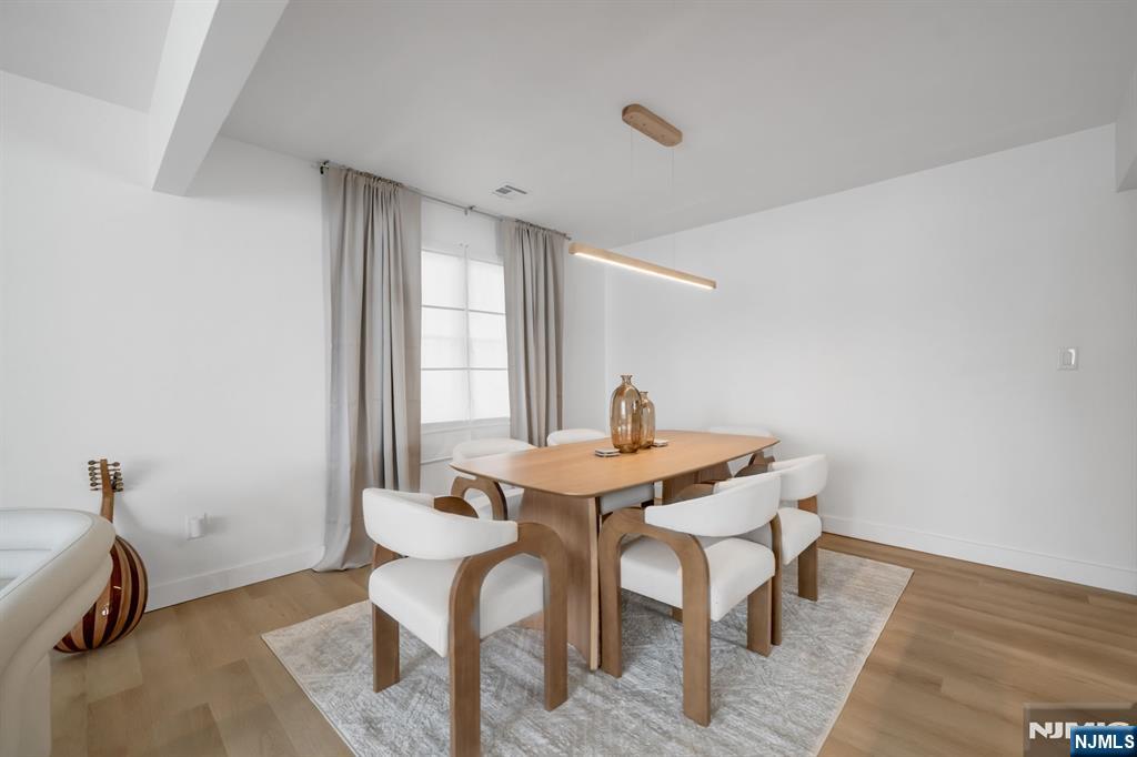 123 Chestnut Street Garfield, NJ 07026 - Photo 4 of 27 a view of a dining room with furniture and window