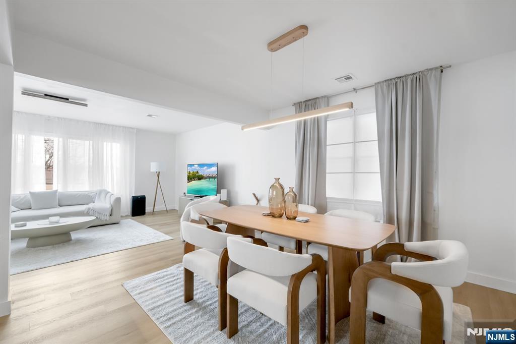 123 Chestnut Street Garfield, NJ 07026 - Photo 5 of 27 a view of a dining room with furniture and window