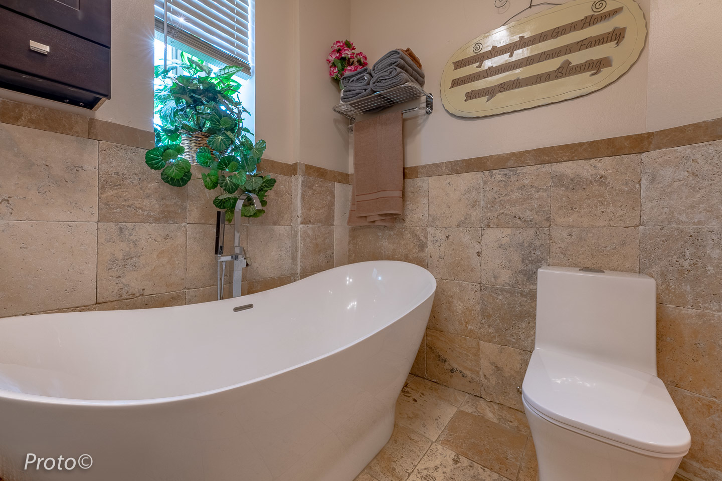 3605 West Cermak Road Chicago, IL 60623 - Photo 11 of 41 a white bath tub sitting in a bathroom