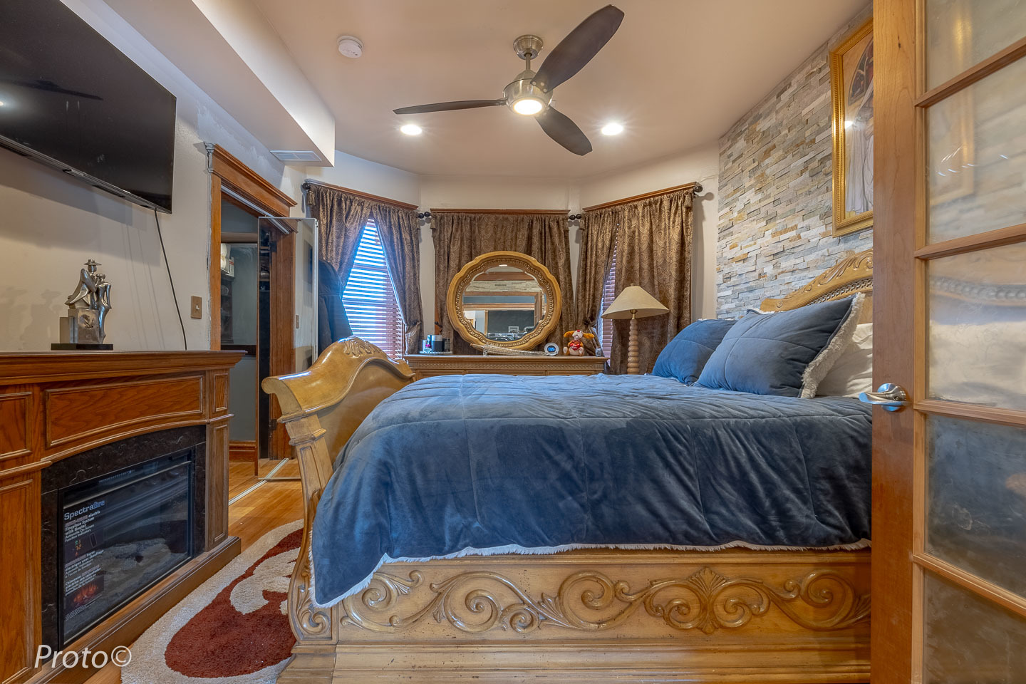 3605 West Cermak Road Chicago, IL 60623 - Photo 13 of 41 a bedroom with a bed and a dresser