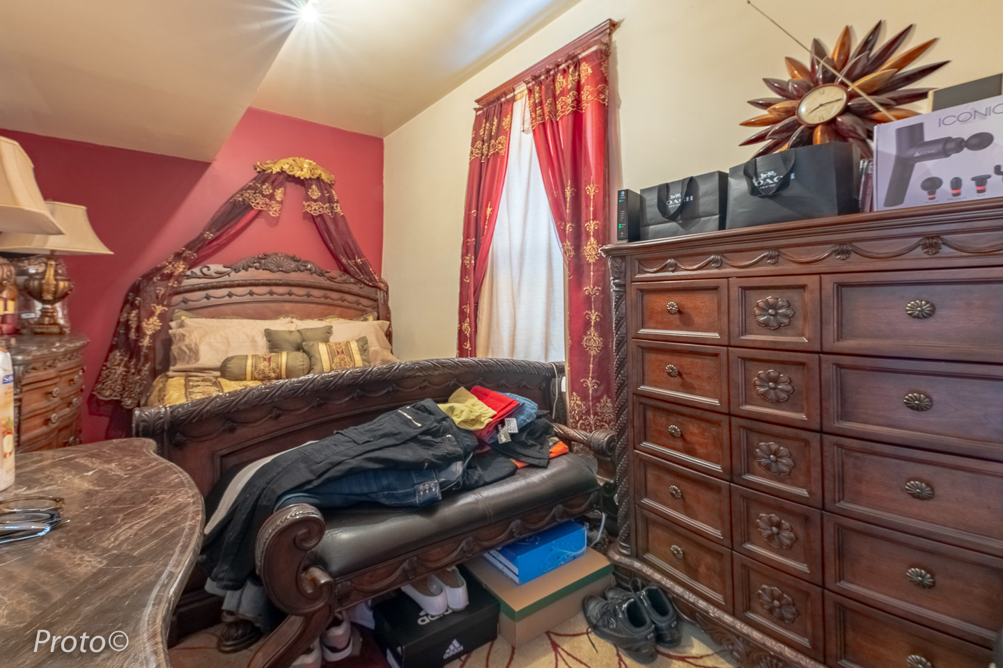 3605 West Cermak Road Chicago, IL 60623 - Photo 14 of 41 a bed sitting in a bedroom next to a window