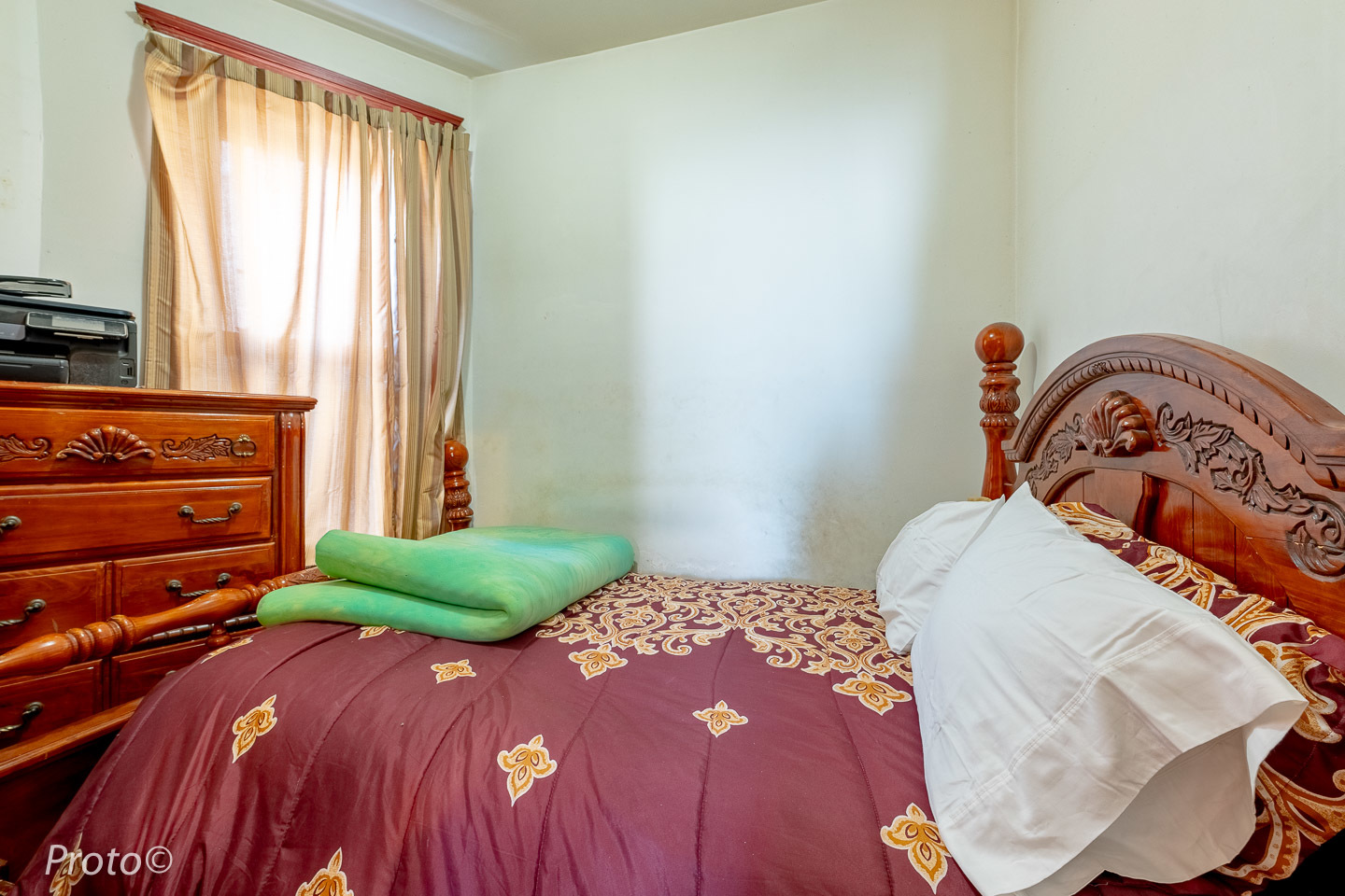 3605 West Cermak Road Chicago, IL 60623 - Photo 27 of 41 a bedroom with a bed and a window