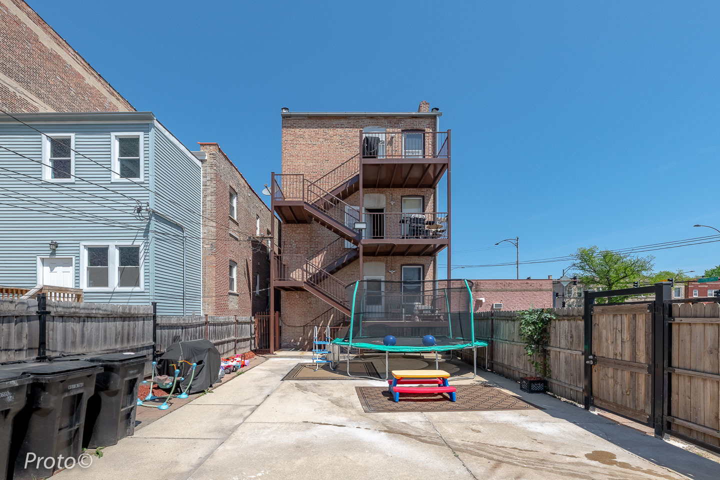 3605 West Cermak Road Chicago, IL 60623 - Photo 40 of 41 a car parked in front of a building