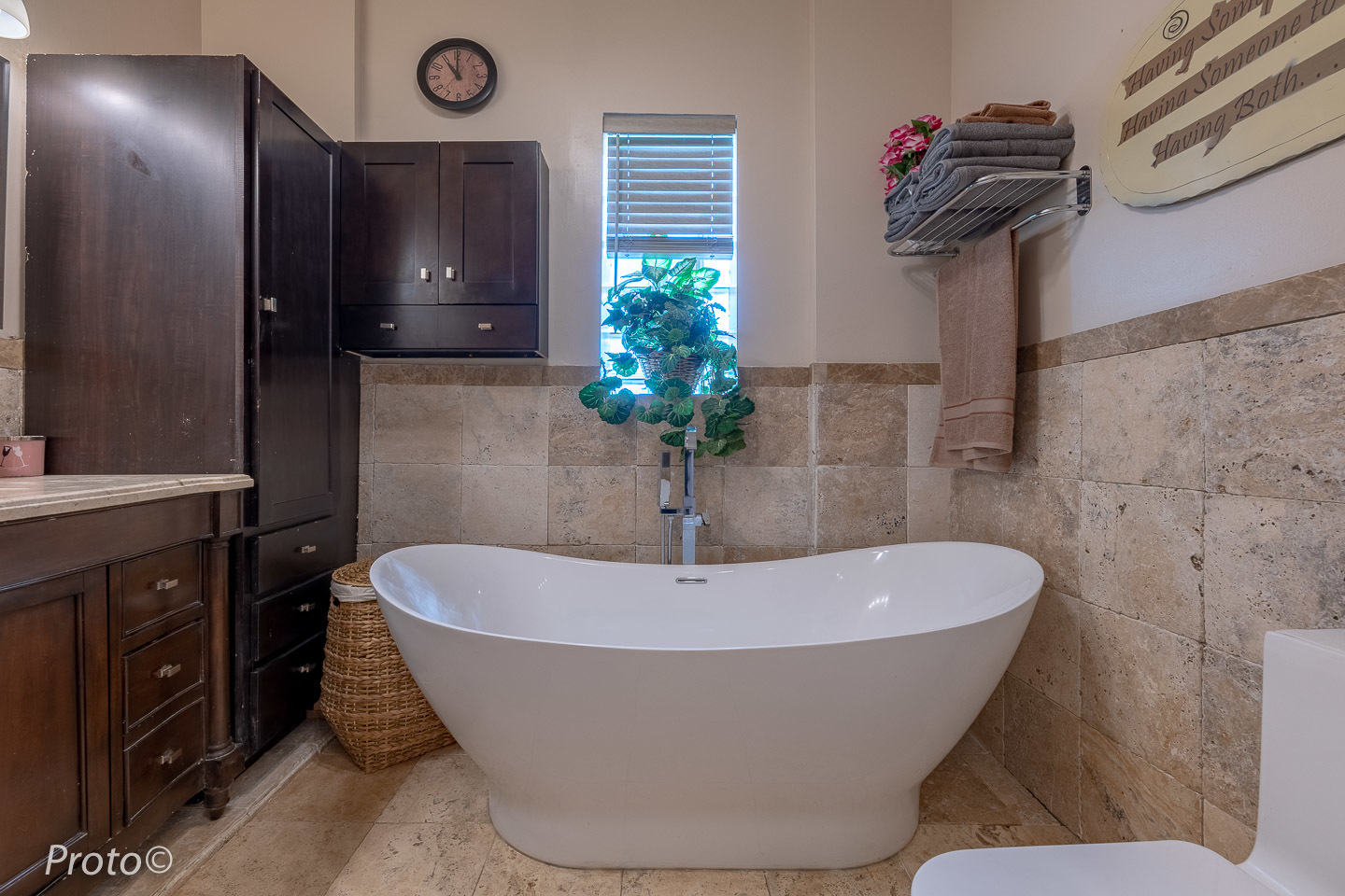 3605 West Cermak Road Chicago, IL 60623 - Photo 9 of 41 a white bath tub sitting in a bathroom