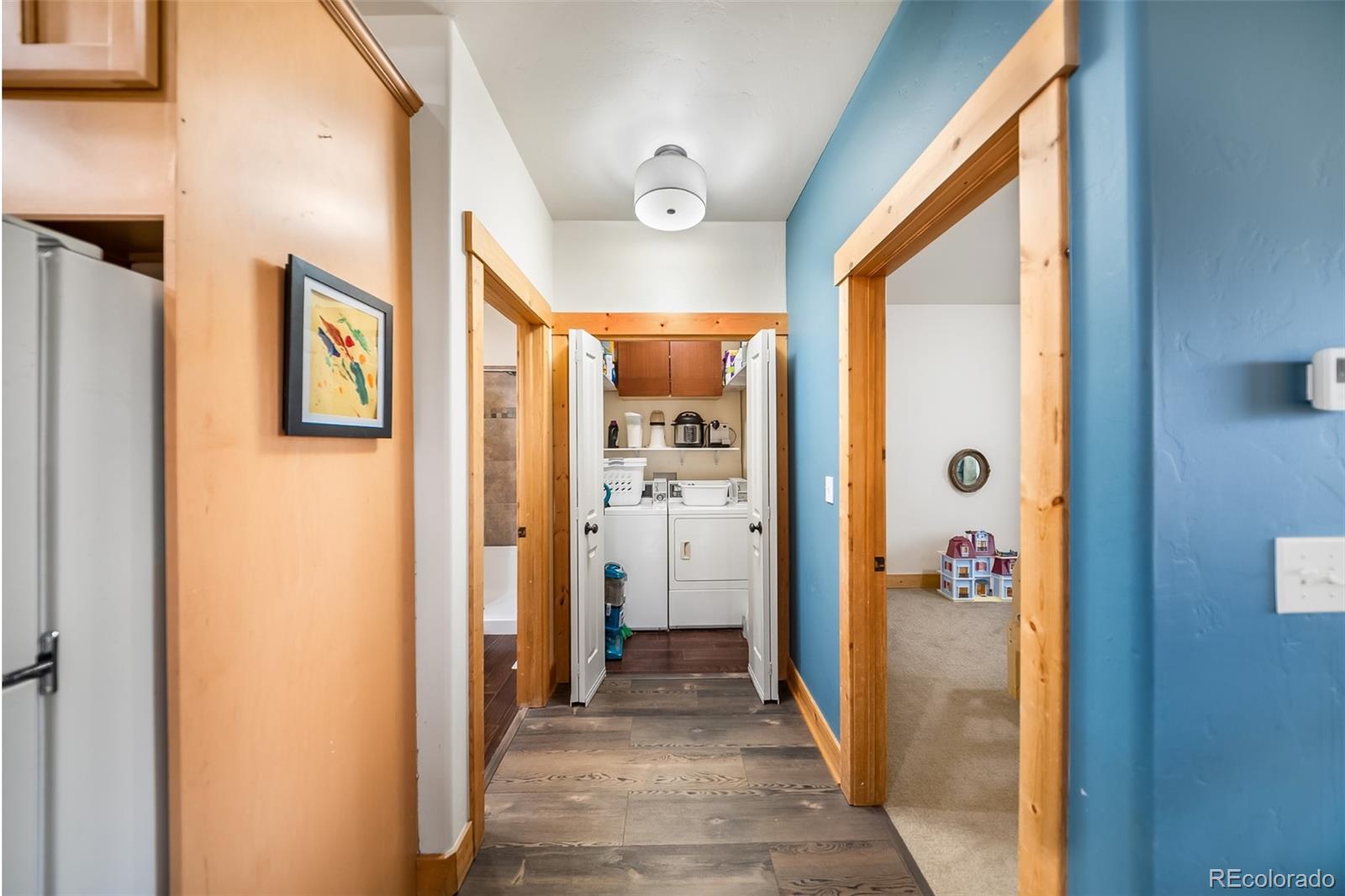 143 East Grand Avenue Hot Sulphur Springs, CO 80451 - Photo 15 of 37 a view of a hallway with windows and entryway