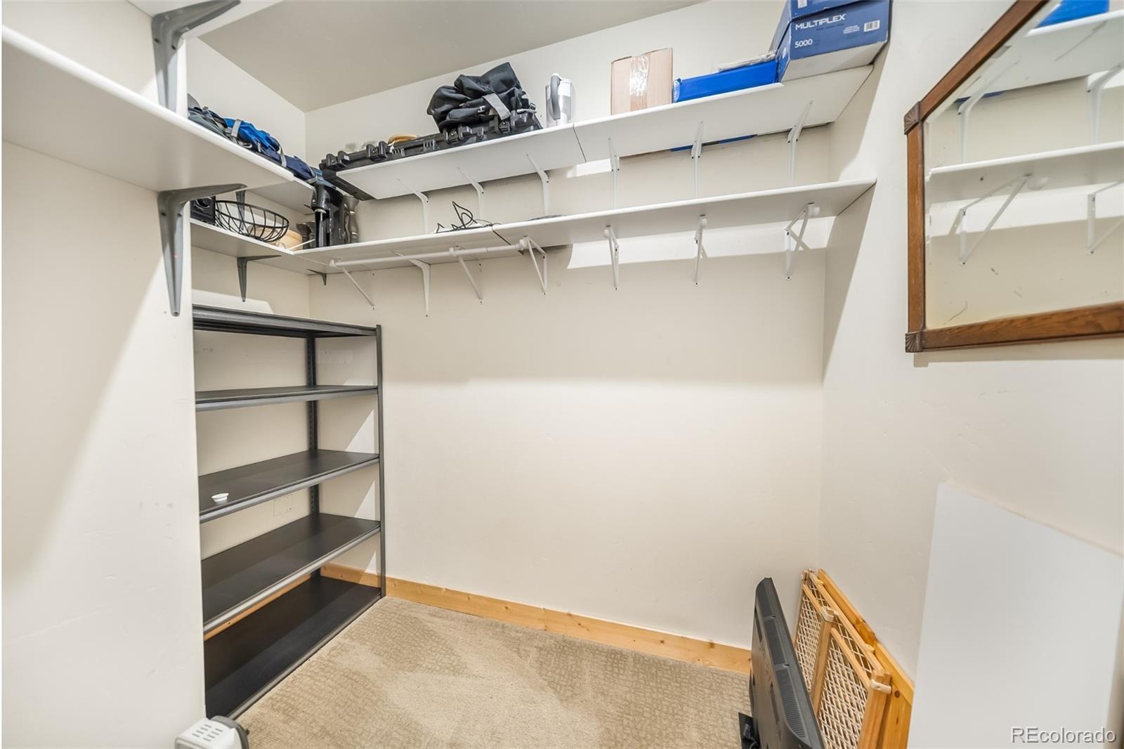 143 East Grand Avenue Hot Sulphur Springs, CO 80451 - Photo 25 of 37 a view of an empty walk in closet