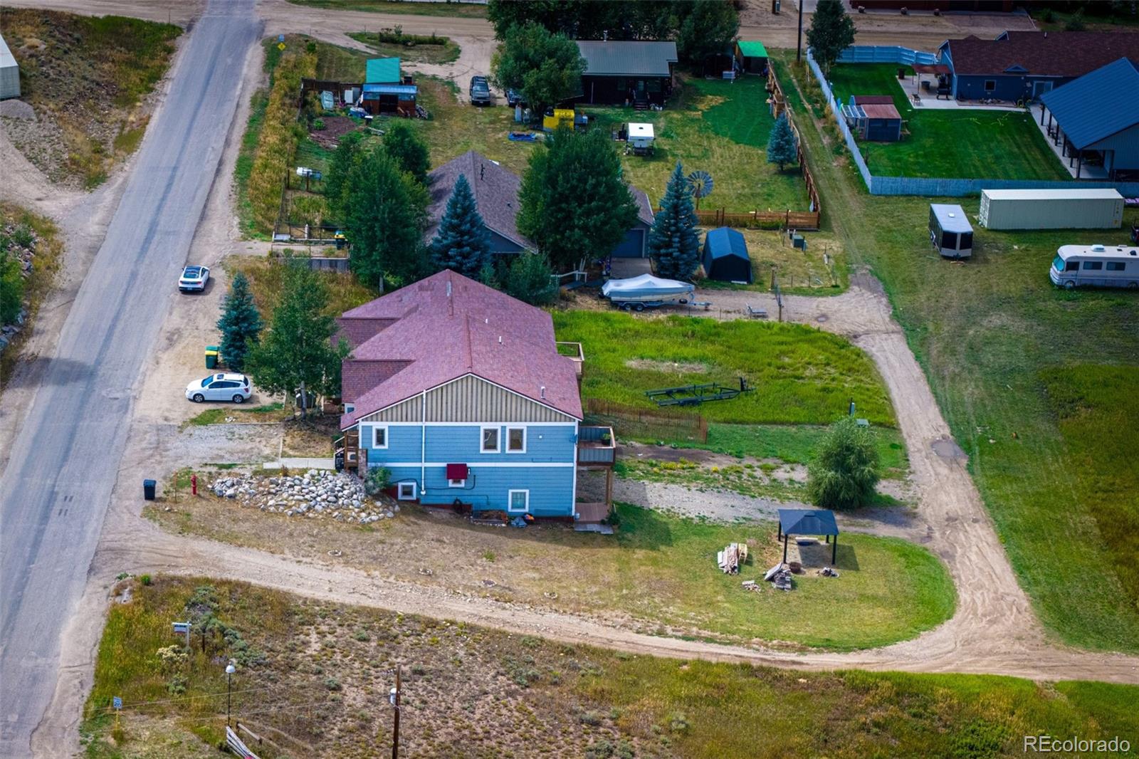 143 East Grand Avenue Hot Sulphur Springs, CO 80451 - Photo 35 of 37 an aerial view of a house with yard swimming pool and outdoor seating