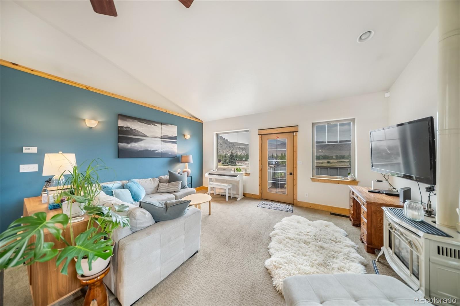143 East Grand Avenue Hot Sulphur Springs, CO 80451 - Photo 4 of 37 a living room with furniture and a flat screen tv