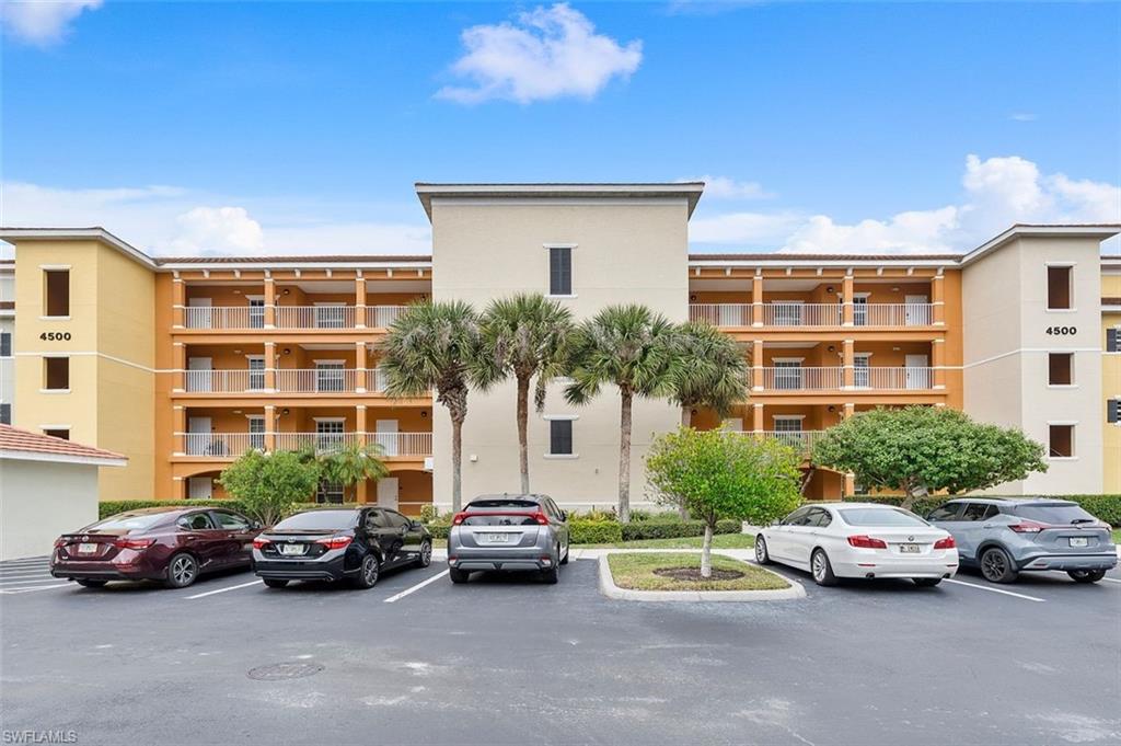 4500 Botanical Pl Circle, Unit 404 Naples, FL 34112 - Photo 1 of 31 View of building exterior