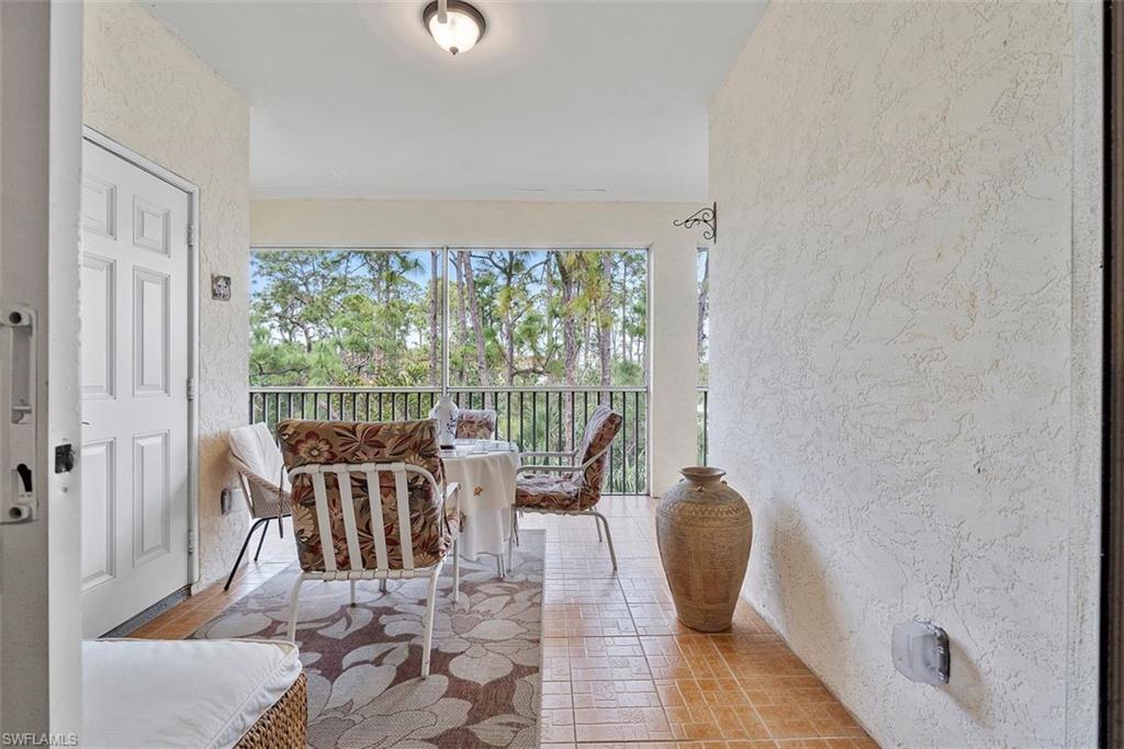 4500 Botanical Pl Circle, Unit 404 Naples, FL 34112 - Photo 15 of 31 View of balcony