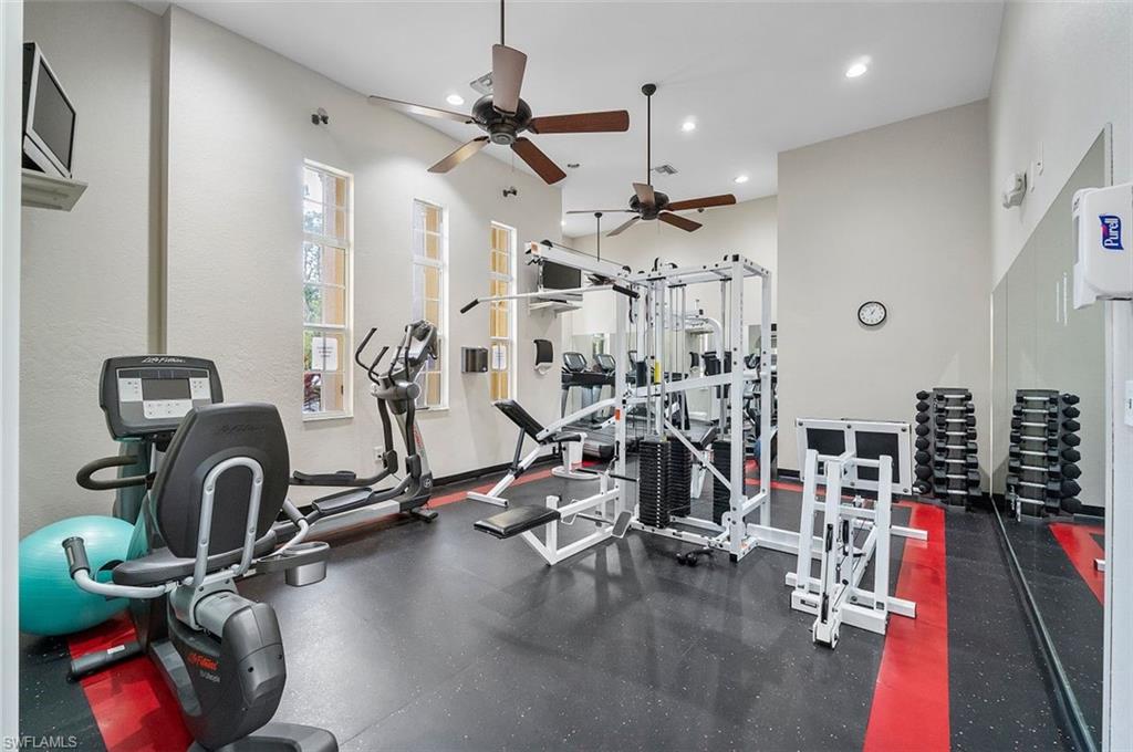 4500 Botanical Pl Circle, Unit 404 Naples, FL 34112 - Photo 26 of 31 Workout area featuring ceiling fan
