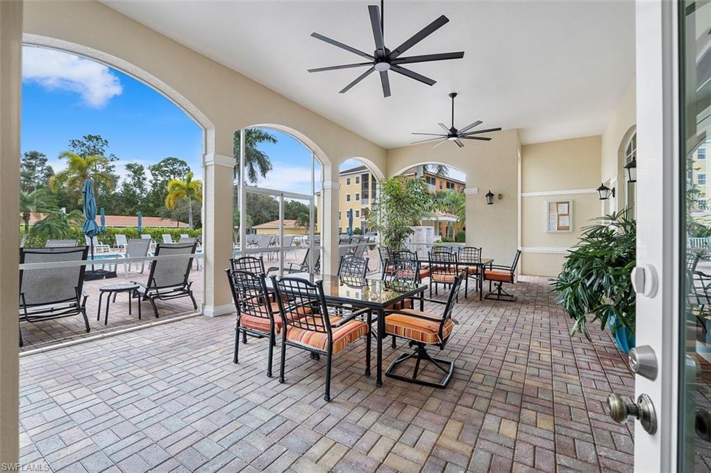 4500 Botanical Pl Circle, Unit 404 Naples, FL 34112 - Photo 28 of 31 View of patio / terrace with ceiling fan