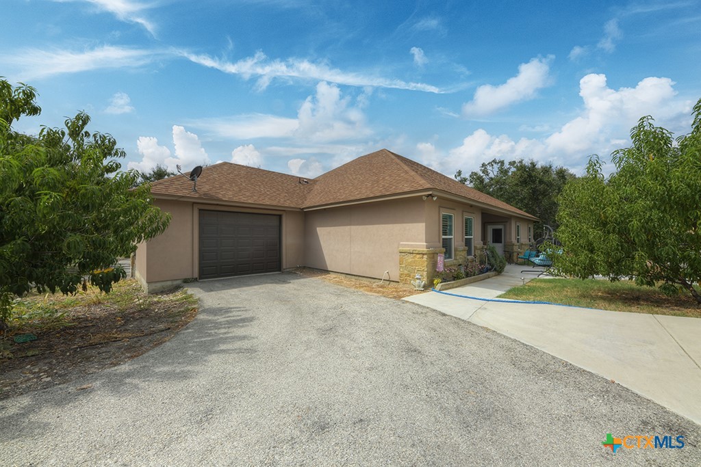 861 Rutherford Fischer, TX 78623 - Photo 23 of 38 Unique PASS THRU Garage with circle drive for easy entrance and exit.