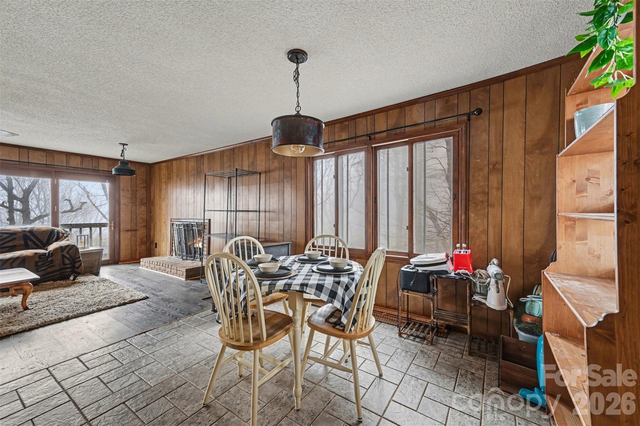 5495 Pine Ridge Drive Connelly Springs, NC 28612 - Photo 1 of 17 a view of a dining room with furniture window and outside view