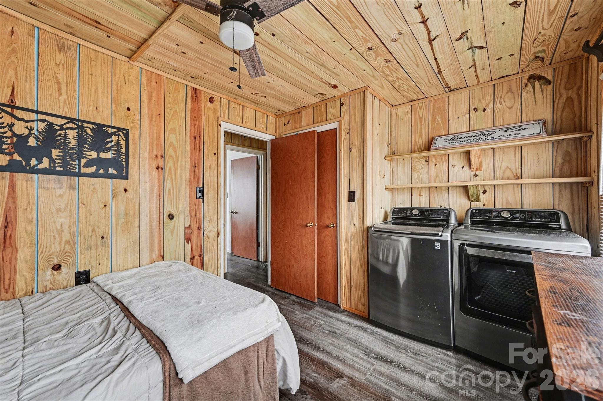 5495 Pine Ridge Drive Connelly Springs, NC 28612 - Photo 12 of 17 a bedroom with a bed and a cabinets
