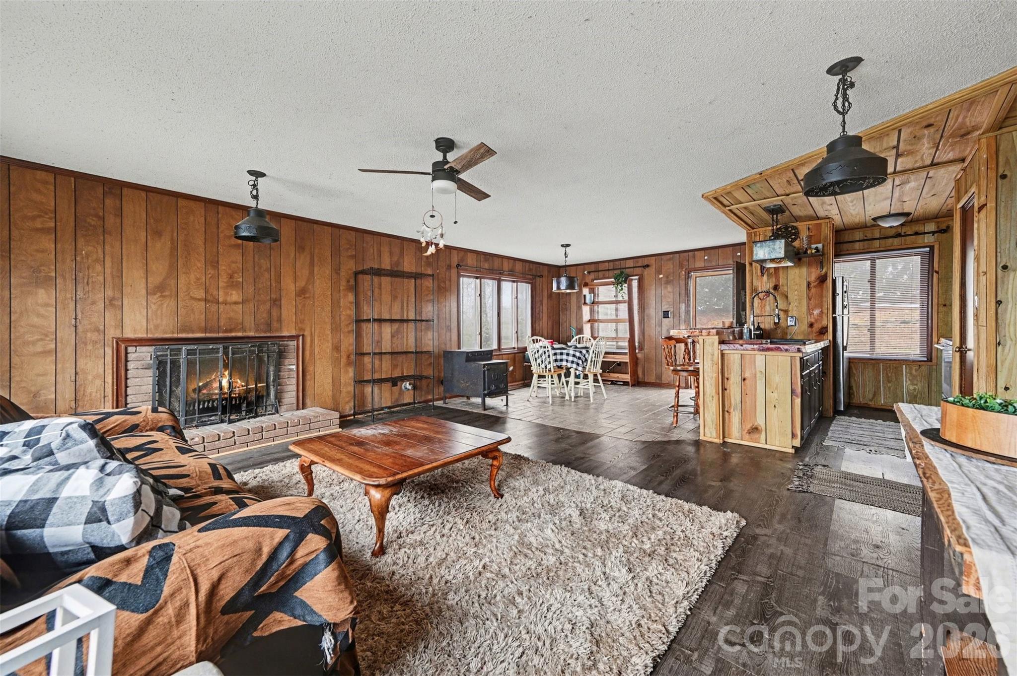 5495 Pine Ridge Drive Connelly Springs, NC 28612 - Photo 4 of 17 a living room with furniture and a fireplace