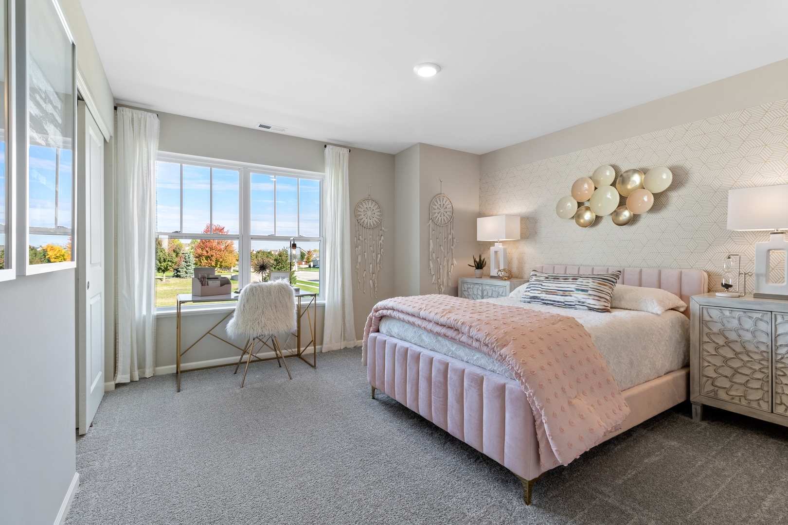 25602 Springview Drive Plainfield, IL 60586 - Photo 15 of 27 a bedroom with a bed and a table in it