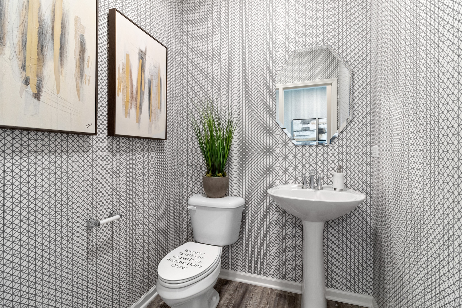25602 Springview Drive Plainfield, IL 60586 - Photo 17 of 27 a bathroom with a toilet sink and mirror