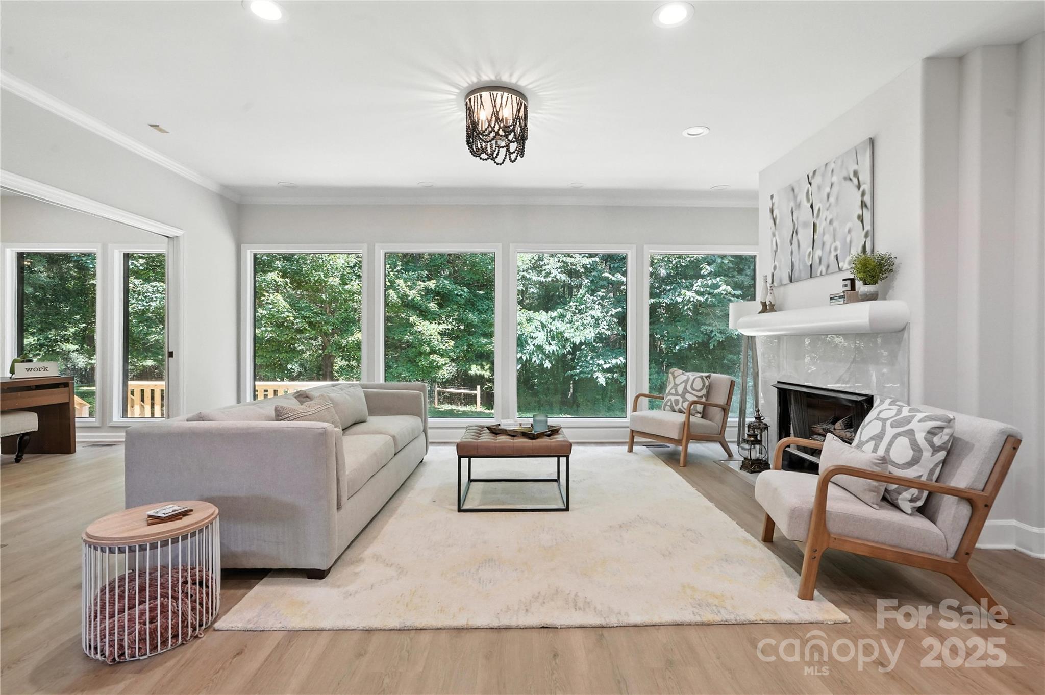 7109 Forney Hill Road Denver, NC 28037 - Photo 11 of 45 a living room with furniture and a fireplace