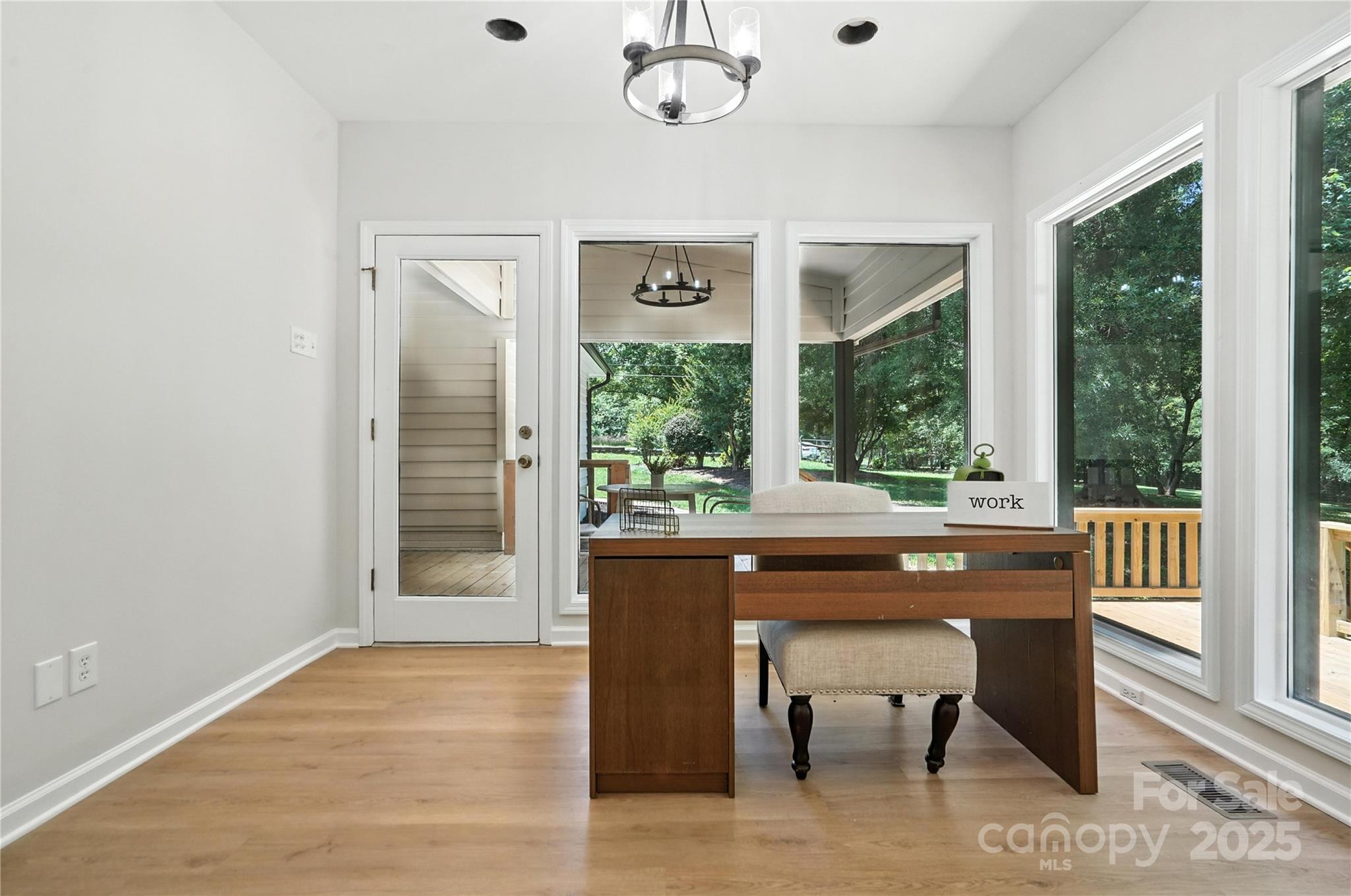 7109 Forney Hill Road Denver, NC 28037 - Photo 15 of 45 a view of a room with a large window and table