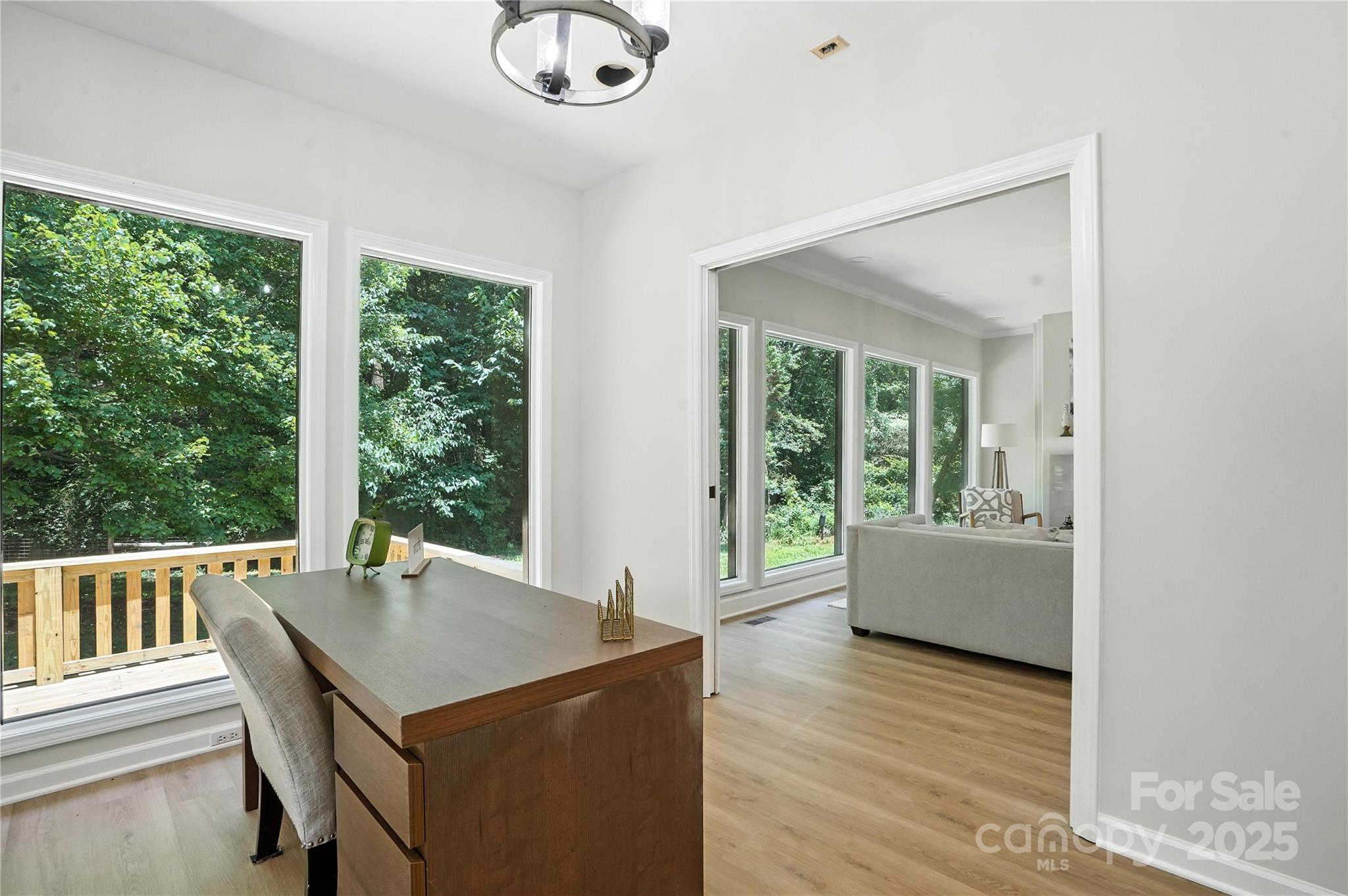 7109 Forney Hill Road Denver, NC 28037 - Photo 16 of 45 a view of a dining room with furniture window and outside view