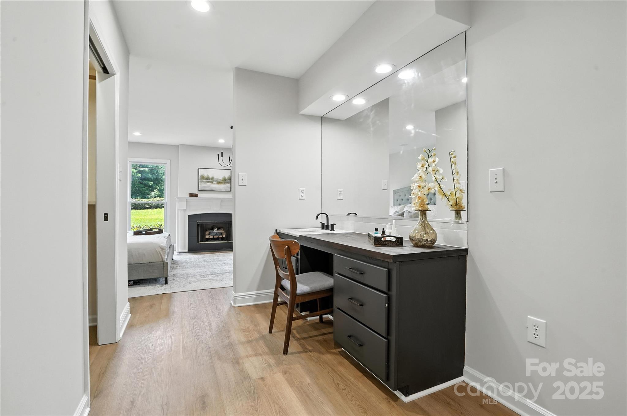 7109 Forney Hill Road Denver, NC 28037 - Photo 20 of 45 a view of a workspace with furniture and a kitchen