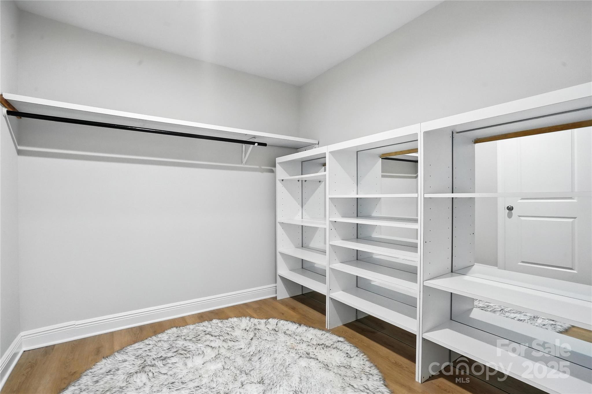 7109 Forney Hill Road Denver, NC 28037 - Photo 26 of 45 a bedroom with a bed and a cabinet