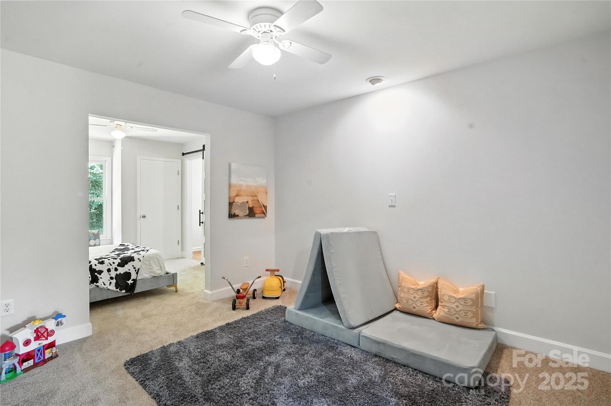 7109 Forney Hill Road Denver, NC 28037 - Photo 33 of 45 a living room with furniture and wooden floor