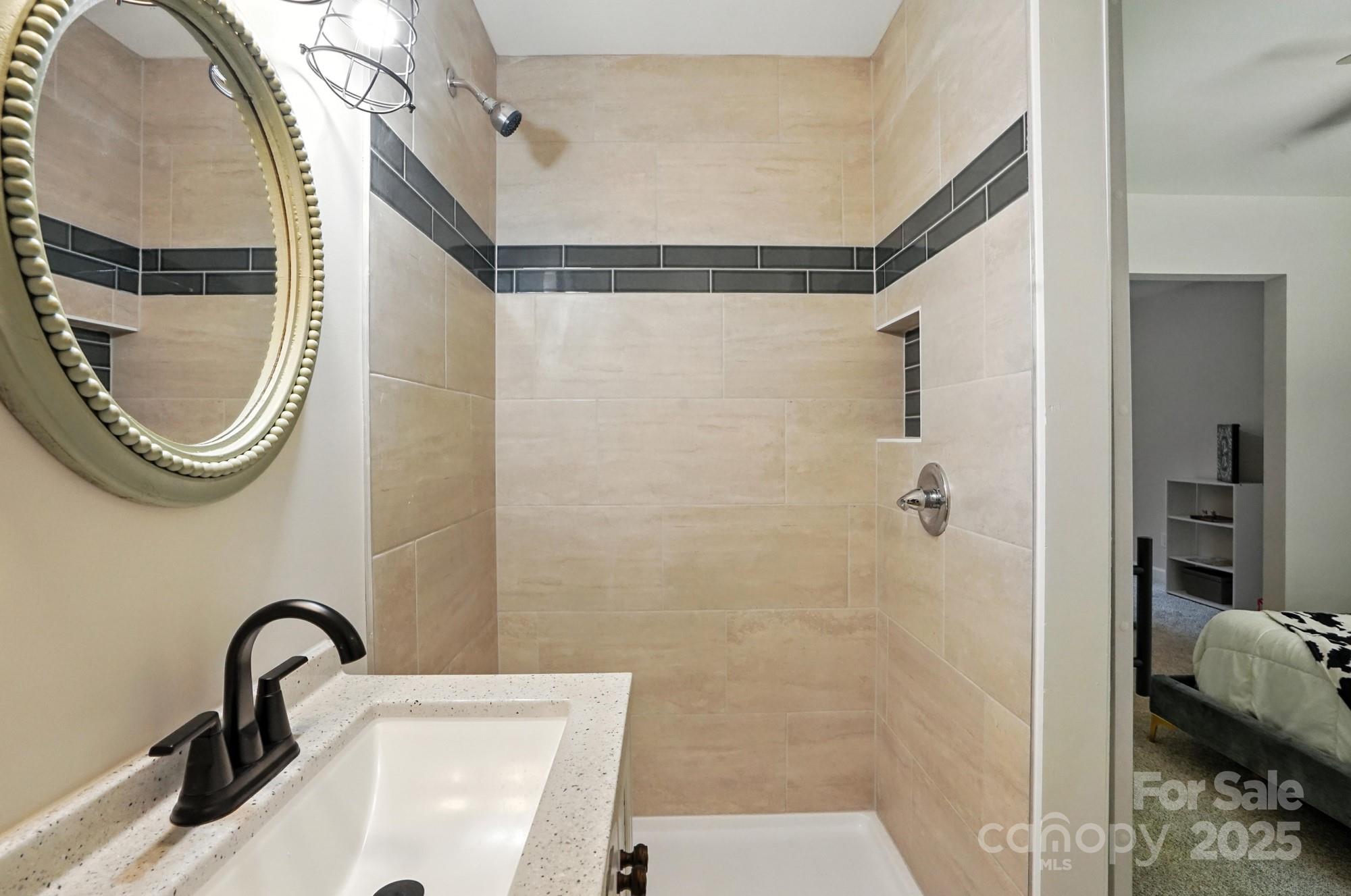 7109 Forney Hill Road Denver, NC 28037 - Photo 36 of 45 a bathroom with a sink a toilet and a mirror